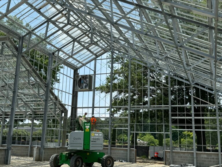 photo of inside the desert biome and glass installation framework