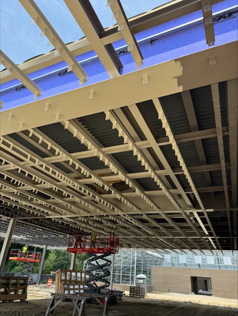 Photo of wooden trellis at the entryway of the Brock Entry Pavilion GOT construction 2024