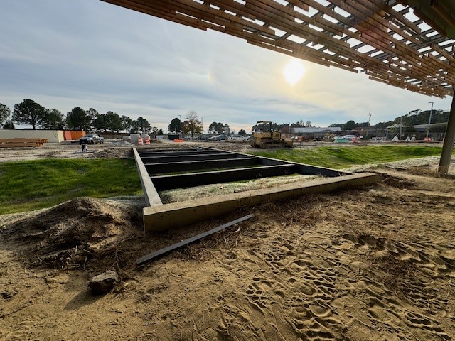 Photo: walkway leading into the Entry Pavilion