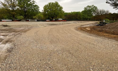 Image of service road and construction lay down site for the Garden of Tomorrow